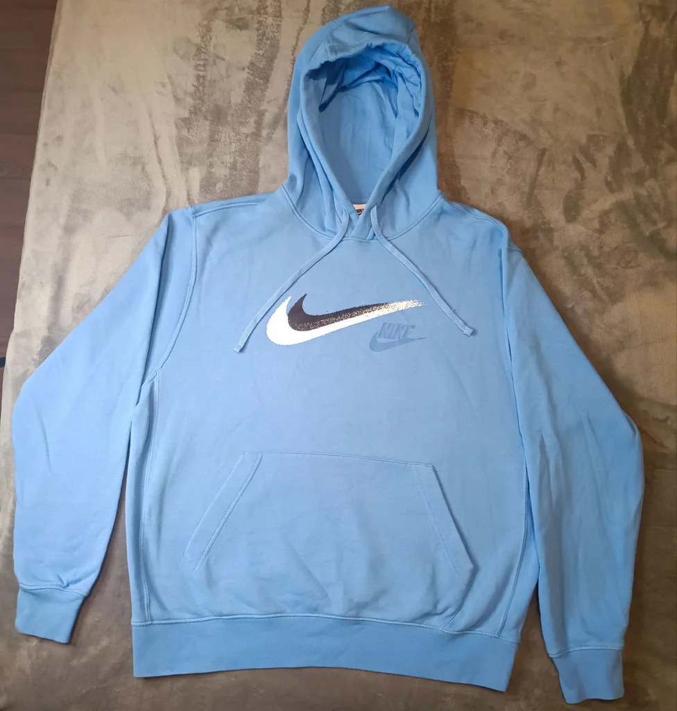 Sweat pull à capuche Nike taille L très bon état coloris bleu clair